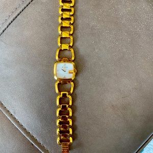 Gucci gold bracelet watch for women